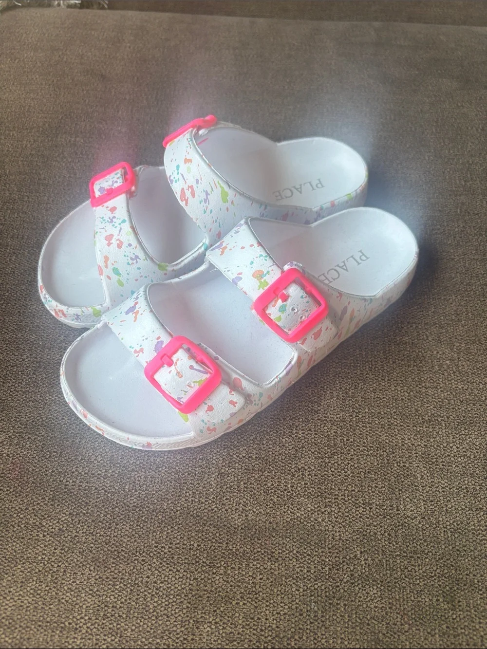 Place White Paint-Splash Sandals with Hot Pink Buckles
